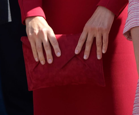 Magrit Kares clutch bag in red suede