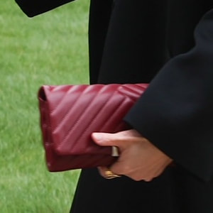 Queen Letizia carried her burgundy Carolina Herrera 'Bimba' Quilted Clutch