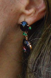 Pomellato Bahia drop earrings featuring amethyst with green tsavorite accent