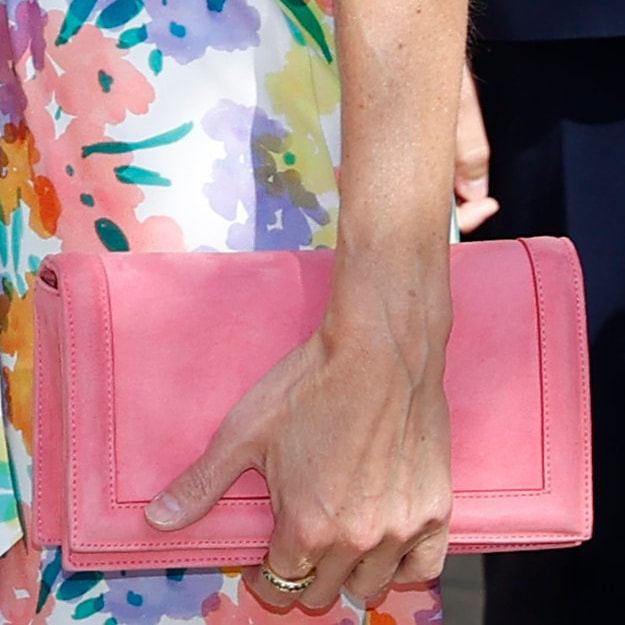 Queen Letizia carries Magrit clutch in pink suede