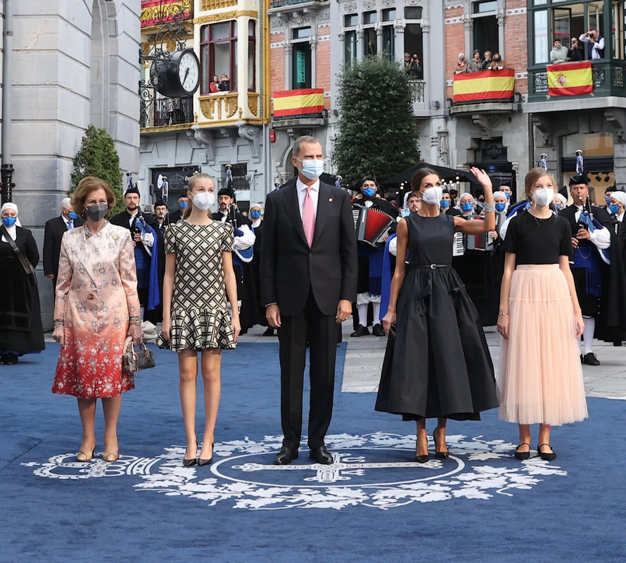 King Felipe VI, Queen Letizia, Princess Leonor, and Infanta Sofia, are joined by Queen Sofia on the blue carpet at the 2021 Princess of Asturias Awards held at the Campoamor Theater in Oviedo