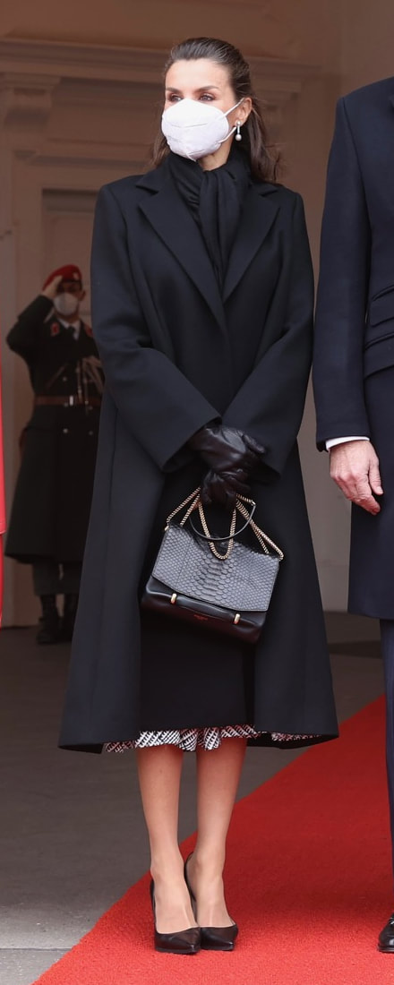 Carolina Herrera Oversized Wool and Cashmere-Blend Felt Coat in Black​ as seen on Queen Letizia.