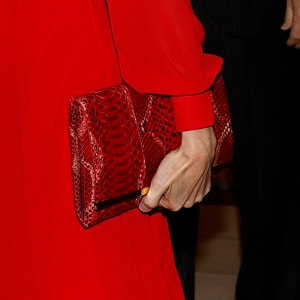 Queen Letizia carries red Carolina Herrera 'Maysa' Clutch Bag