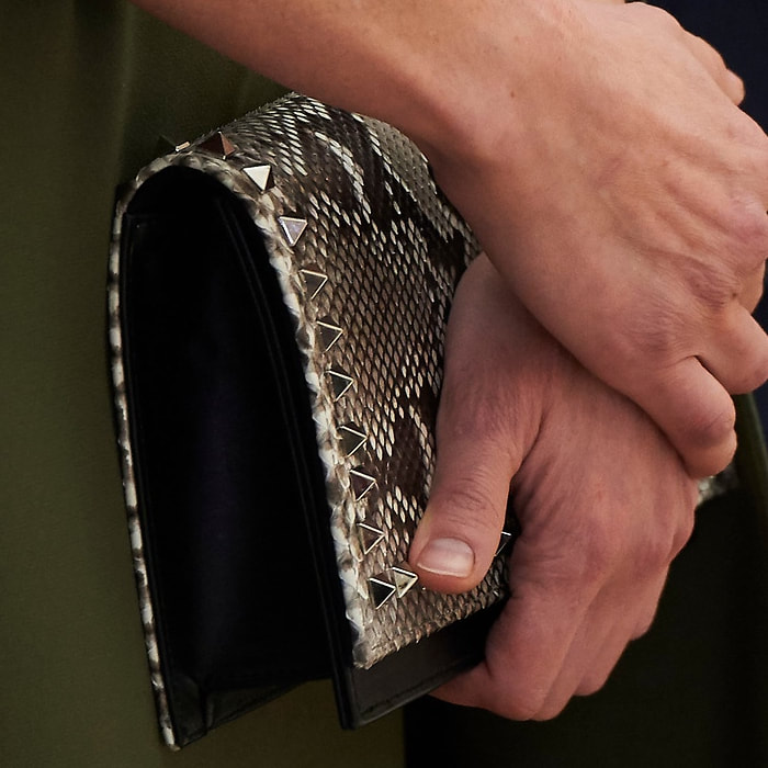 Magrit studded snakeskin clutch bag