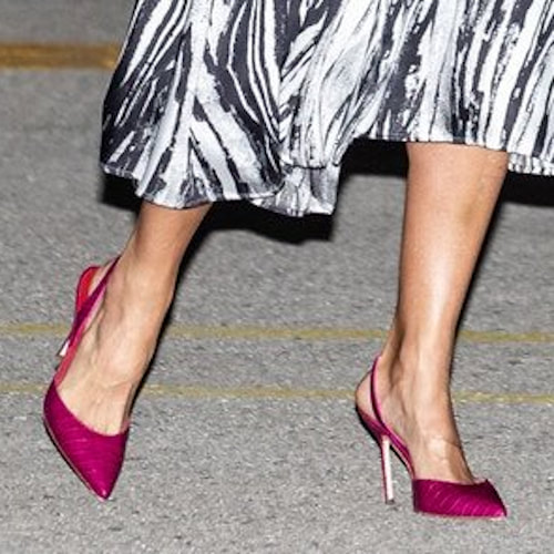 Queen Letizia wears fuchsia pink Carolina Herrera croc embossed slingback pumps