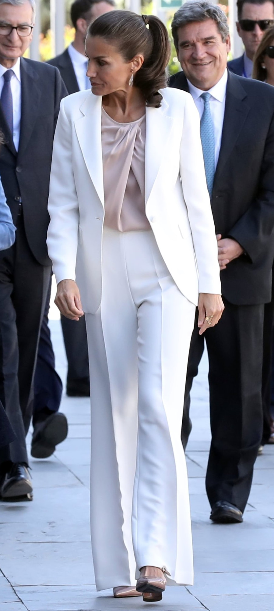 Queen Letizia wears white Carolina Herrera trouser suit
