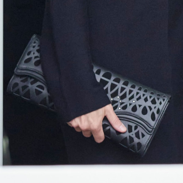 Queen Letizia carries Hugo Boss laser-cut clutch bag 