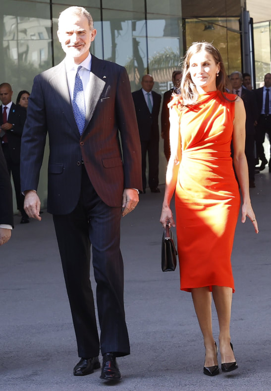 Queen Letizia brings back her orange Zara x Narciso Rodriguez dress for day in Tenerife