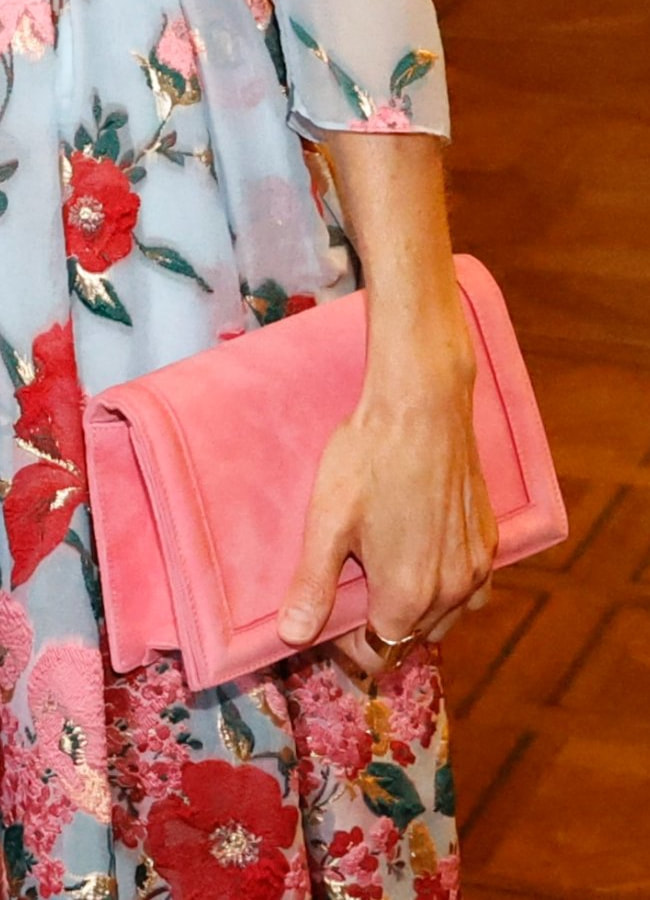 Queen Letizia carries Magrit bubblegum pink suede clutch handbag