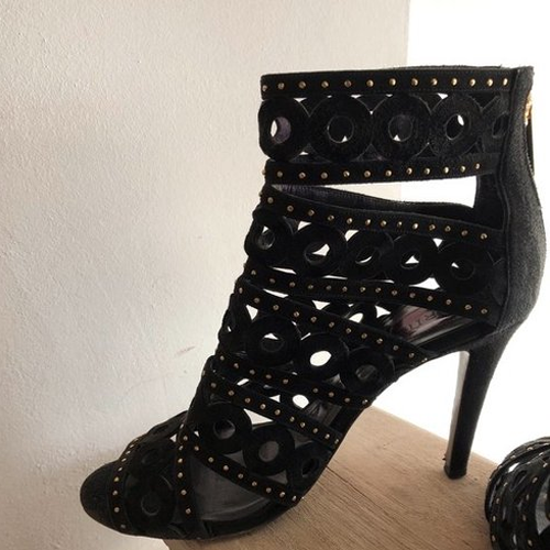 Magrit Perforated Gladiator Sandals in Black Suede
