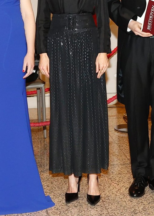 Queen Letizia wears black shimmering maxi skirt with drop waist