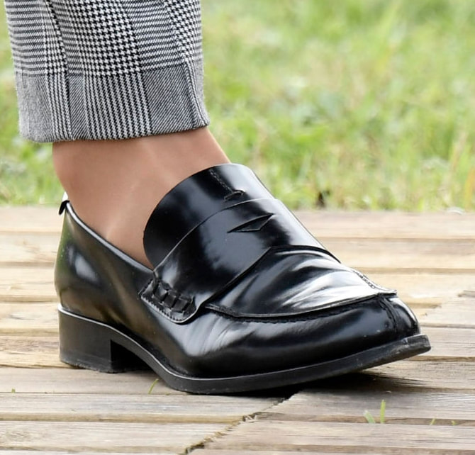 Queen Letizia wears black penny loafers