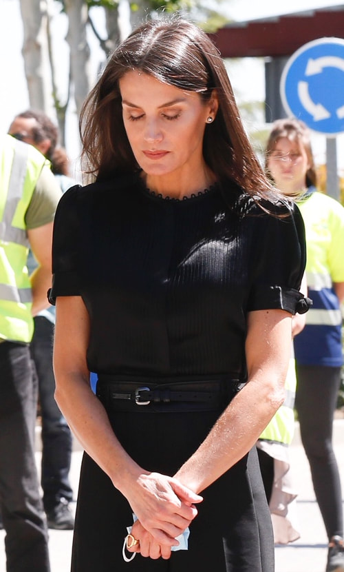 Queen Letizia wears black satin pintuck blouse