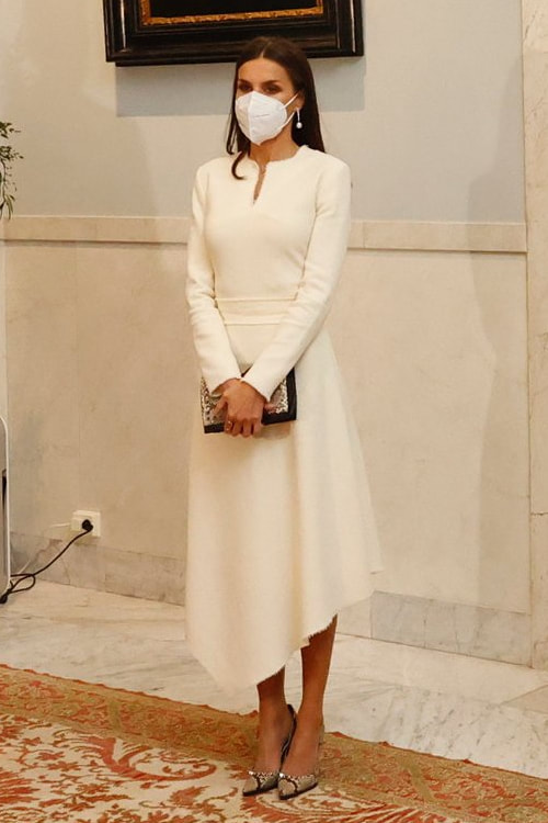 Queen Letizia wears cream frayed asymmetrical hem dress