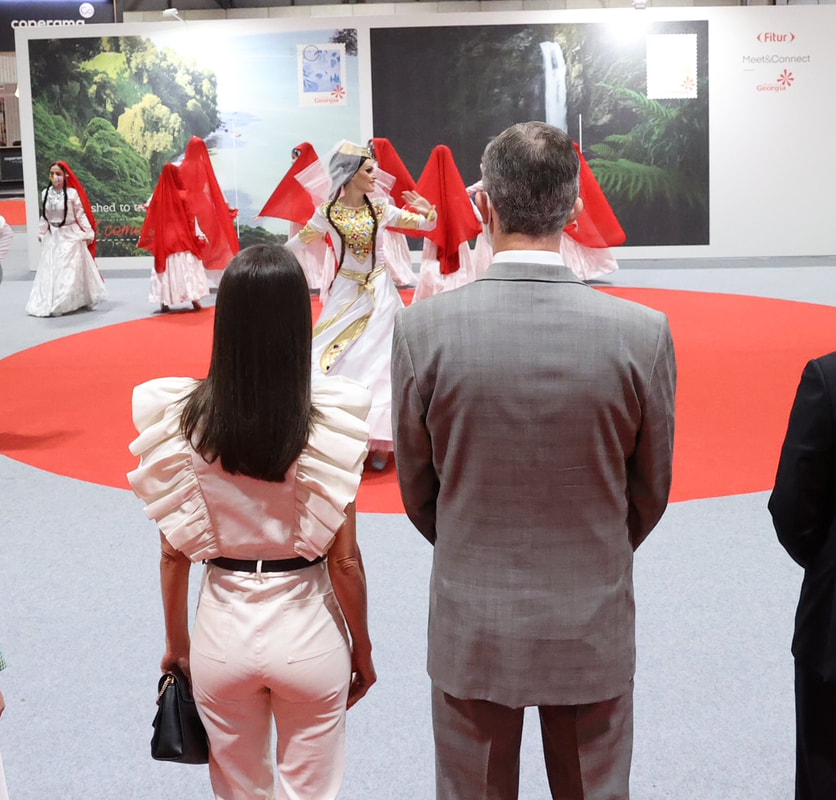 King Felipe VI and Queen Letizia of Spain watch Georgian dancers at FITUR 2021