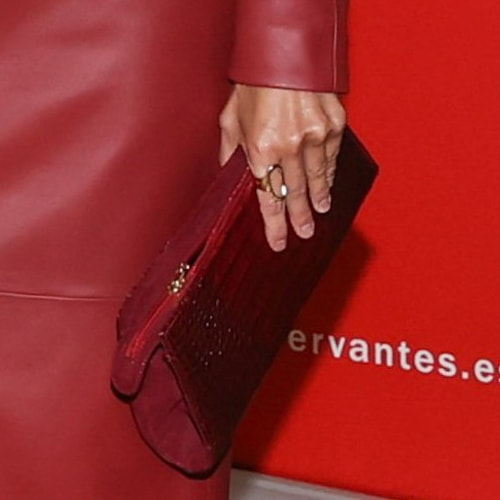Queen Letizia carries burgundy Magrit 'Mara' crocodile effect leather clutch bag