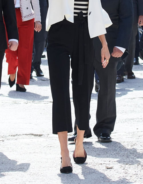 Queen Letizia wears black cropped tie-waist trousers