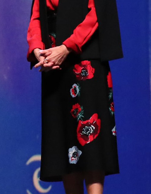 Queen Letizia wears black floral poppy embroidered midi skirt