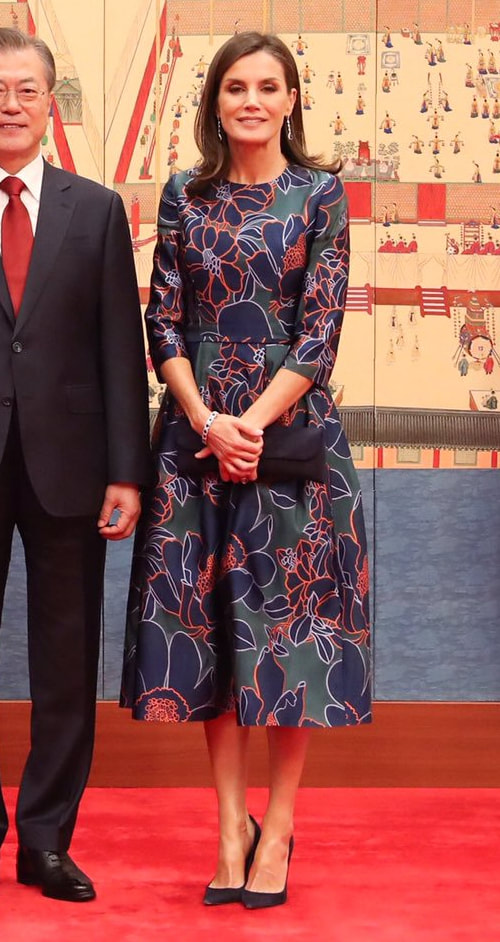 Queen Letizia wears Carolina Herrera peacock floral print dress